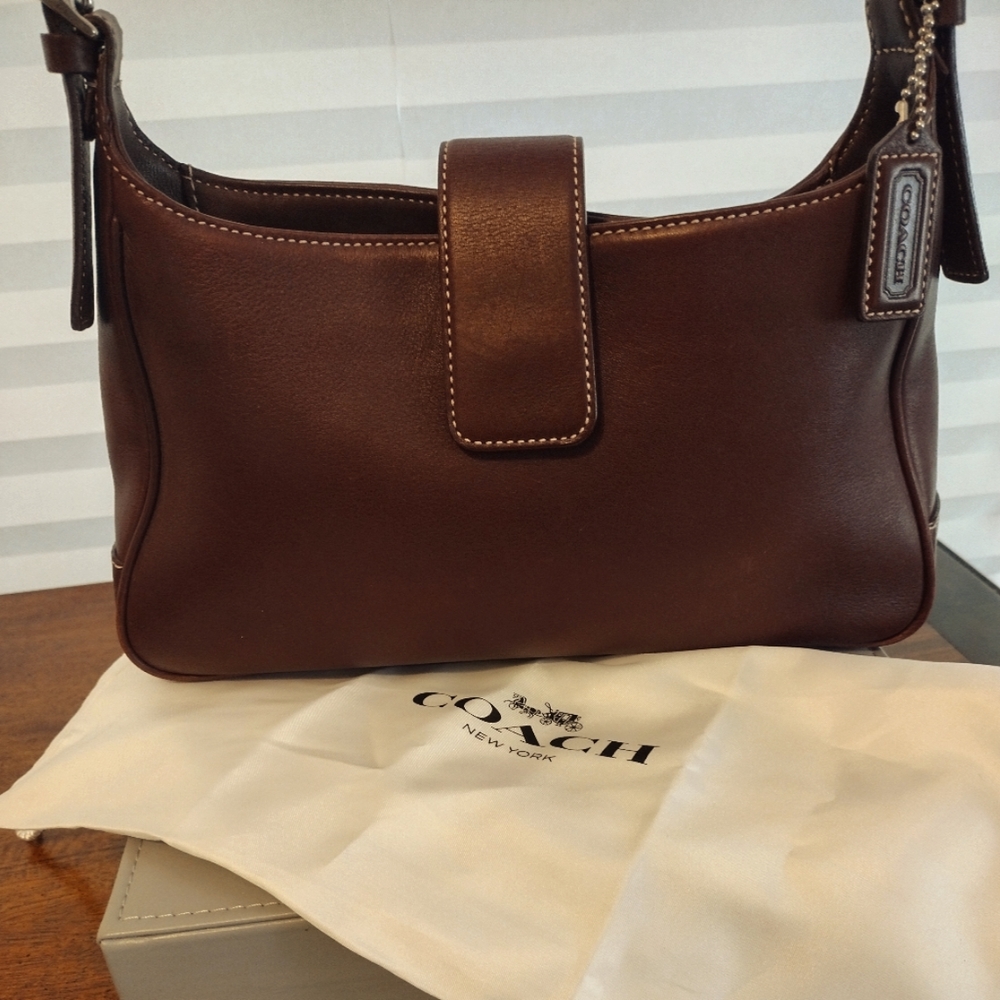 Coach handbag in dark burgundy brown